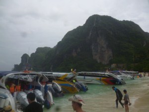 Boats docked at the beach